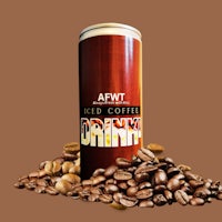 a can of coffee beans and coffee beans on a brown background